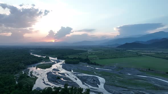 Flying over Alazani river at sunset. Kvareli, Georgia 2022 summer