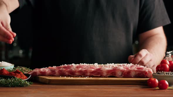 Man Chef Cooking Ribs Closeup