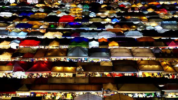 Train Night Market Ratchada (Talad Rot Fai) at night in Bangkok, Thailand