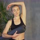 Beautiful Female Holds Yoga Mat in Arm and Looks with Smile Poses for Camera - VideoHive Item for Sale
