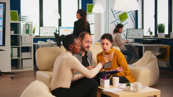 International Business Team Talking to African Woman Mentor