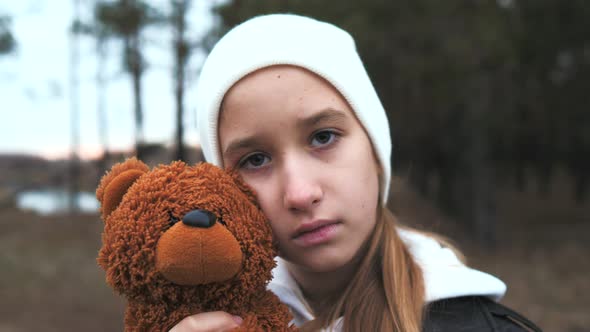 Sad Depressed Girl with Teddy Bear Punishment