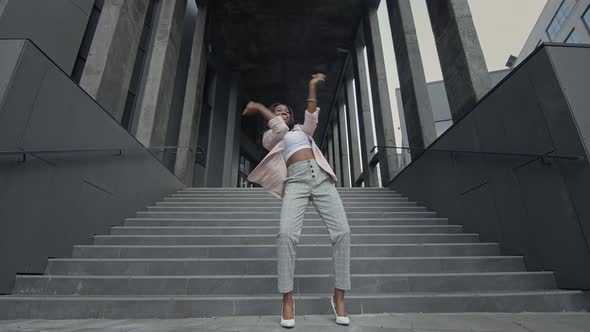 Young Black Girl Dancing Modern Dance On The Stairs