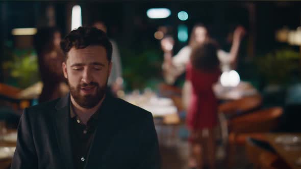 Handsome Man Dancing Celebrating New Year on Friends Meeting Party at Night Bar