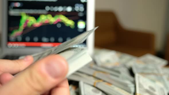 Man Counting Money in His Hand