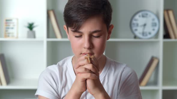 13 Years Old Boy Makes a Wish Prays Religion Concept