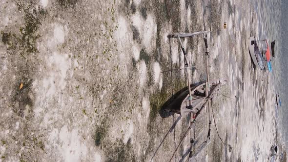 Vertical Video of Low Tide in the Ocean Near the Coast of Zanzibar Tanzania Aerial View