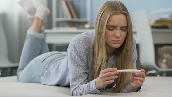 Two Strips on Pregnancy Test, Teenage Girl Finds Out About Having Baby, Fear