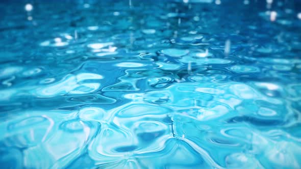 Pure Blue Water in the Pool with Light Reflections alt