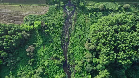 Railway Bridge in Countryside Passing Above Small River