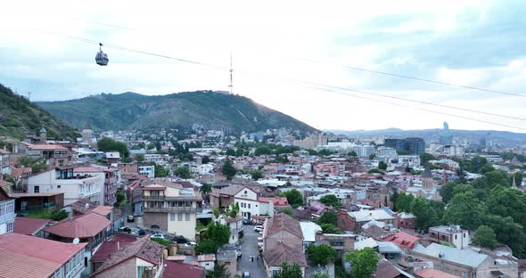 Tbilisi, Georgia - May 23 2022: Aerial view of Old Tbilisi, Flying over historic houses