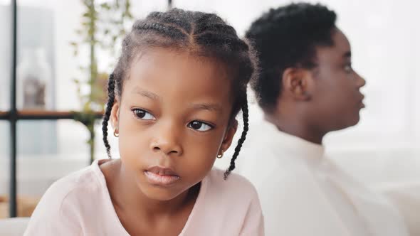 Portrait of Little African American Girl Sad Daughter Feels Disappointment After Quarrel with Afro