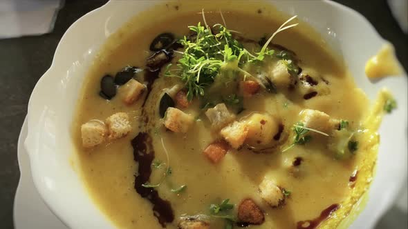 Potato soup with croutons in a bowl