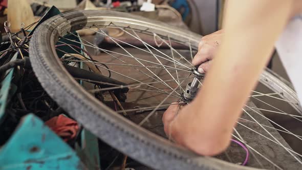A Young Teenager Wants To Repair His Old Bike in the Countryside  Slow Motion