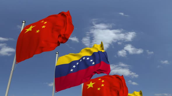 Waving Flags of Venezuela and China