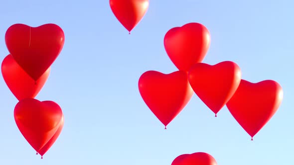 Seamless looping animation with many heart-shaped red balloons. Love, Valentines