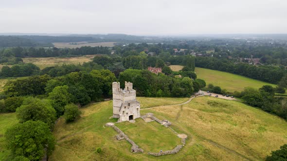 Donnington medieval castle surrounded by green English countryside, Berkshire county, UK. Aerial dro