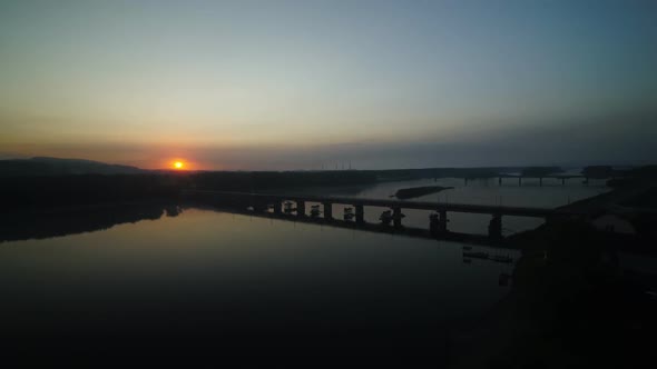 Bridges Across the River at Sunset