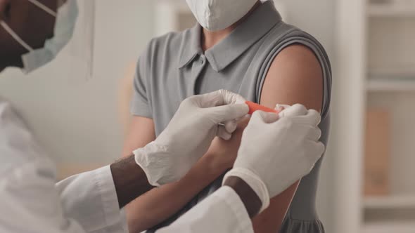 Schoolgirl Being Vaccinated from Covid-19