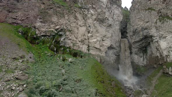 Dirty Waterfall Sultan High in the Mountains Near Elbrus in Summer