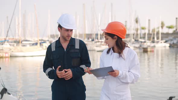 Yacht Club Worker Talking with Port State Inspector