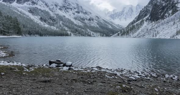 Snow Mountain Lake Timelapse at the Autumn Time. Wild Nature and Rural Mount Valley. Green Forest of