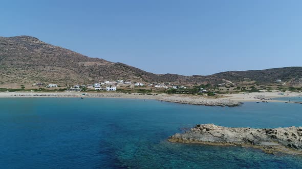 Magganari beach on the island of Ios in the Cyclades in Greece seen from the sky alt