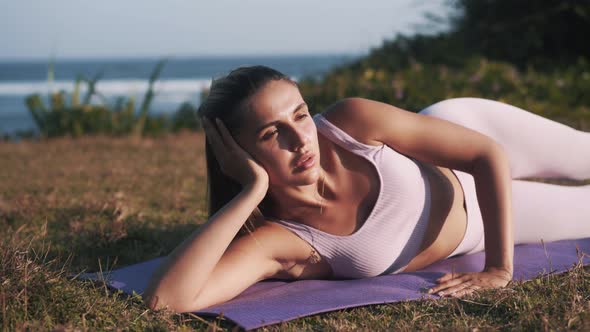 Outdoor Workout to Have a Perfect Body Girl Doing Side Leg Lifts