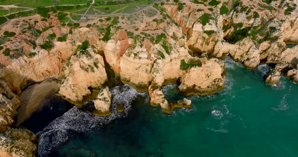 Drone video from the Algarve coast on a partly cloudy day