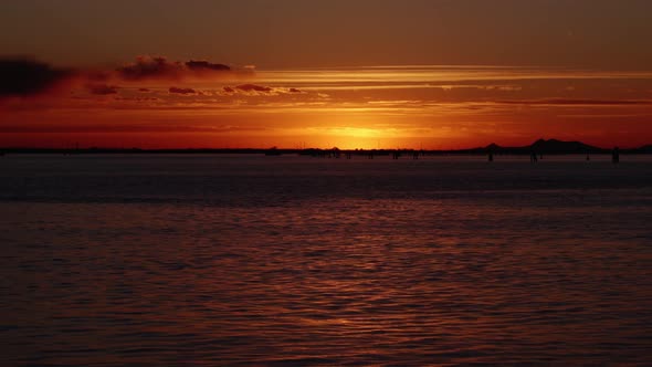 Venetian Lagoon with Rippling Water Reflecting Sunset