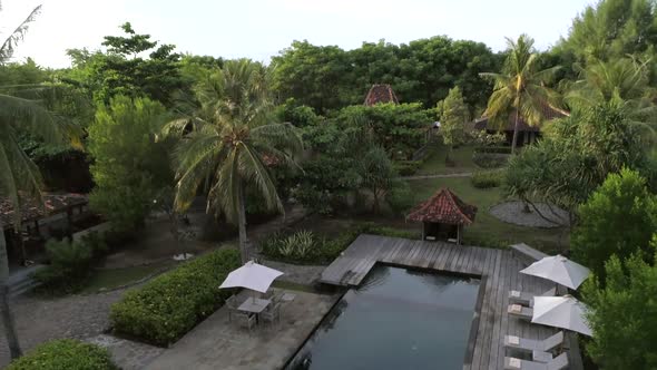 Aerial view of swimming pool in luxury resort, Gili Trawangan island, Indonesia.