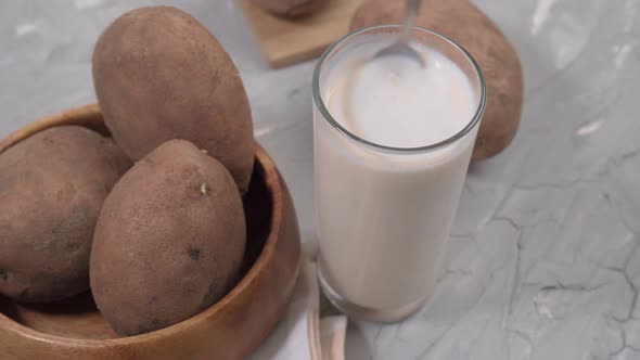 Potato Milk Vegan Milk in Glass with Potato