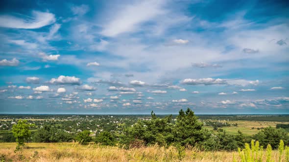 Landscape Fields and Moving Clouds in Blue Sky. Timelapse. Amazing Rural Valley. Ukraine