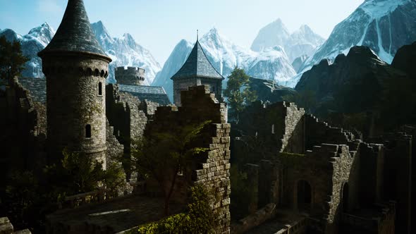 Ancient Castle at Sunrise with Mountains in Background