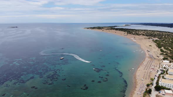 Aerial footage of the beautiful small town known as St George South, Greek city of Corfu Greece, 