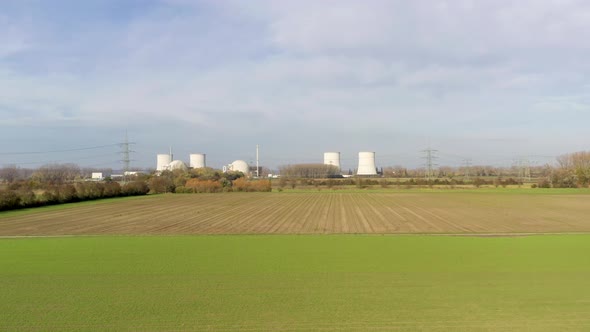 Drone video of an ascending flight towards a nuclear power plant