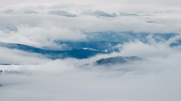 Flowing Clouds Time Lapse in Winter Mountain