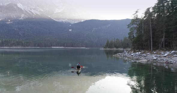 Aerial of two friends in canoe, Bavaria, Germany