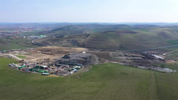 Garbage pile in trash dump or landfill near Cluj-Napoca, Romania.Pollution concept. Drone view.