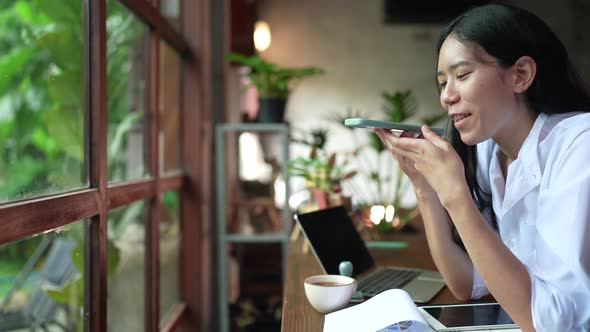 Young Asian woman person using mobile phone talking online with friends, connect with cyberspace.