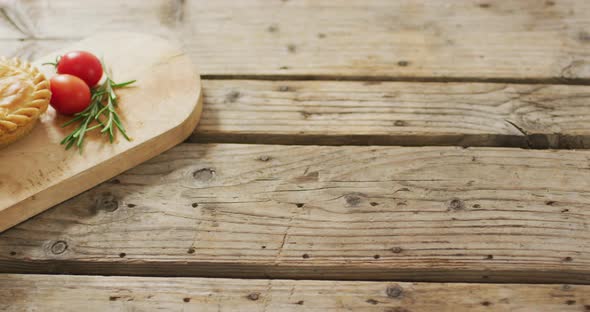 Video of pies seen from above on wooden background