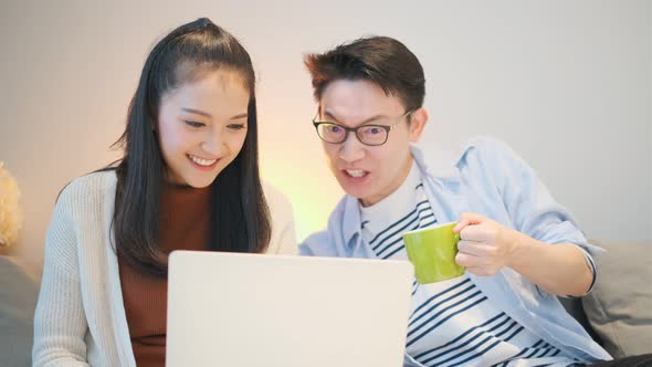 entertain shopping online together with laugh and smile weekend activity on sofa home sweet home / Videohive, Stock footage