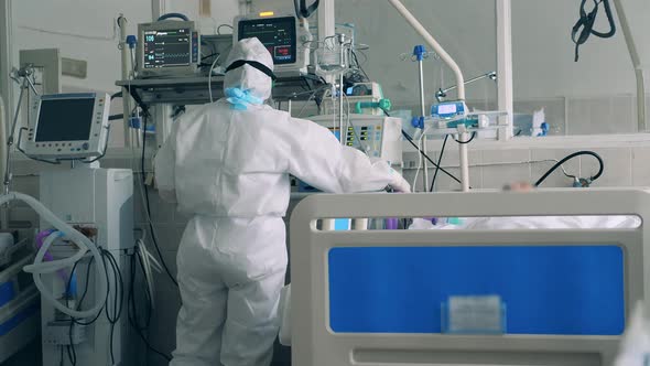 Nurse in Hazmat Working at a Modern Coronavirus Medical Center