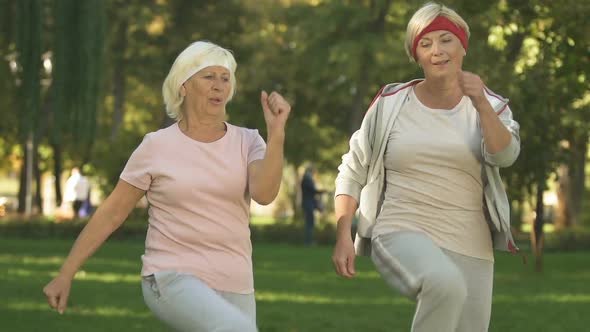 Two Senior Ladies Training Outside