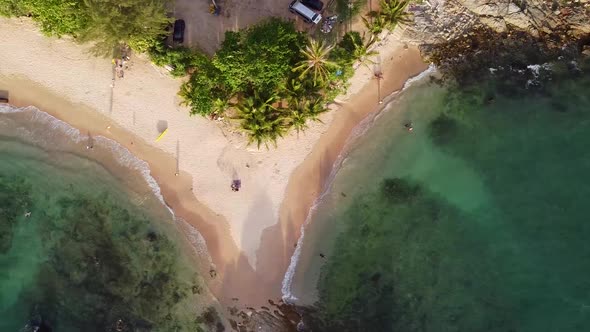 Small Tropical Beach with Rocky Point Aerial