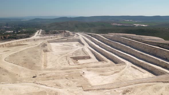 Aerial view of opencast mining quarry. Stone quarry