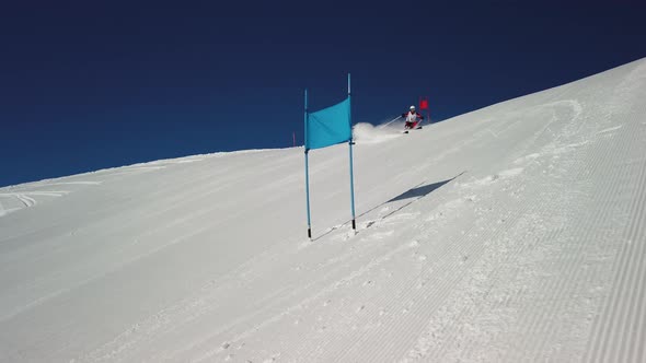 Slow Motion Professional Giant Slalom Skier on Ski Track