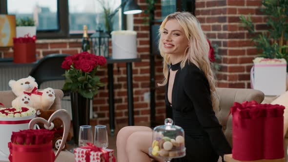 Portrait of Blonde Woman Advertising Heart Shape Sign