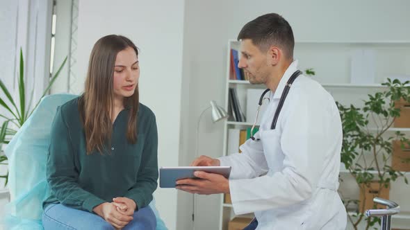 Young Woman at a Doctor'S Appointment in a Medical Clinic
