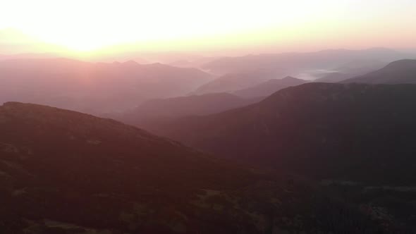 Fairytale Sunset Over Mountain Peaks in Summer